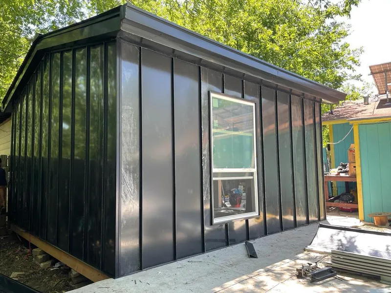 Black standing seam metal wall panels for Roof Inspection in Delanco